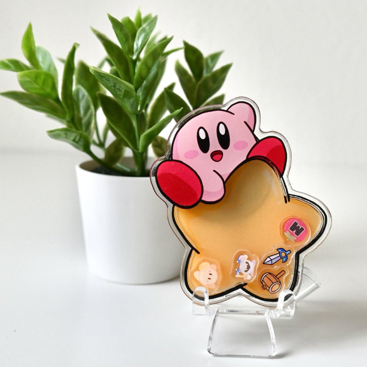 KIRBY WITH STAR AND ITEMS THEMED ACRYLIC SHAKER BADGE REEL