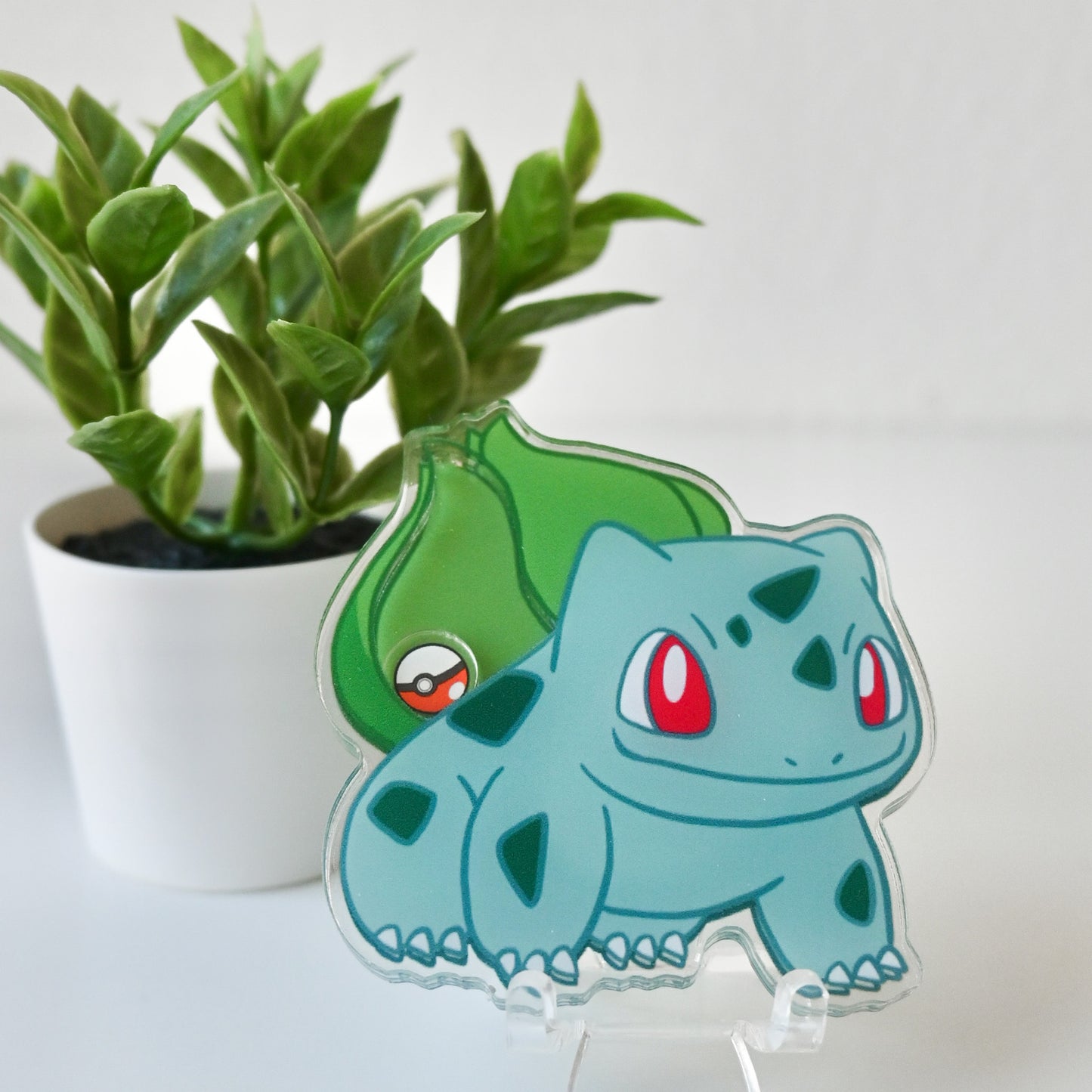 POKEMON - BULBASAUR THEMED ACRYLIC SHAKER BADGE REEL