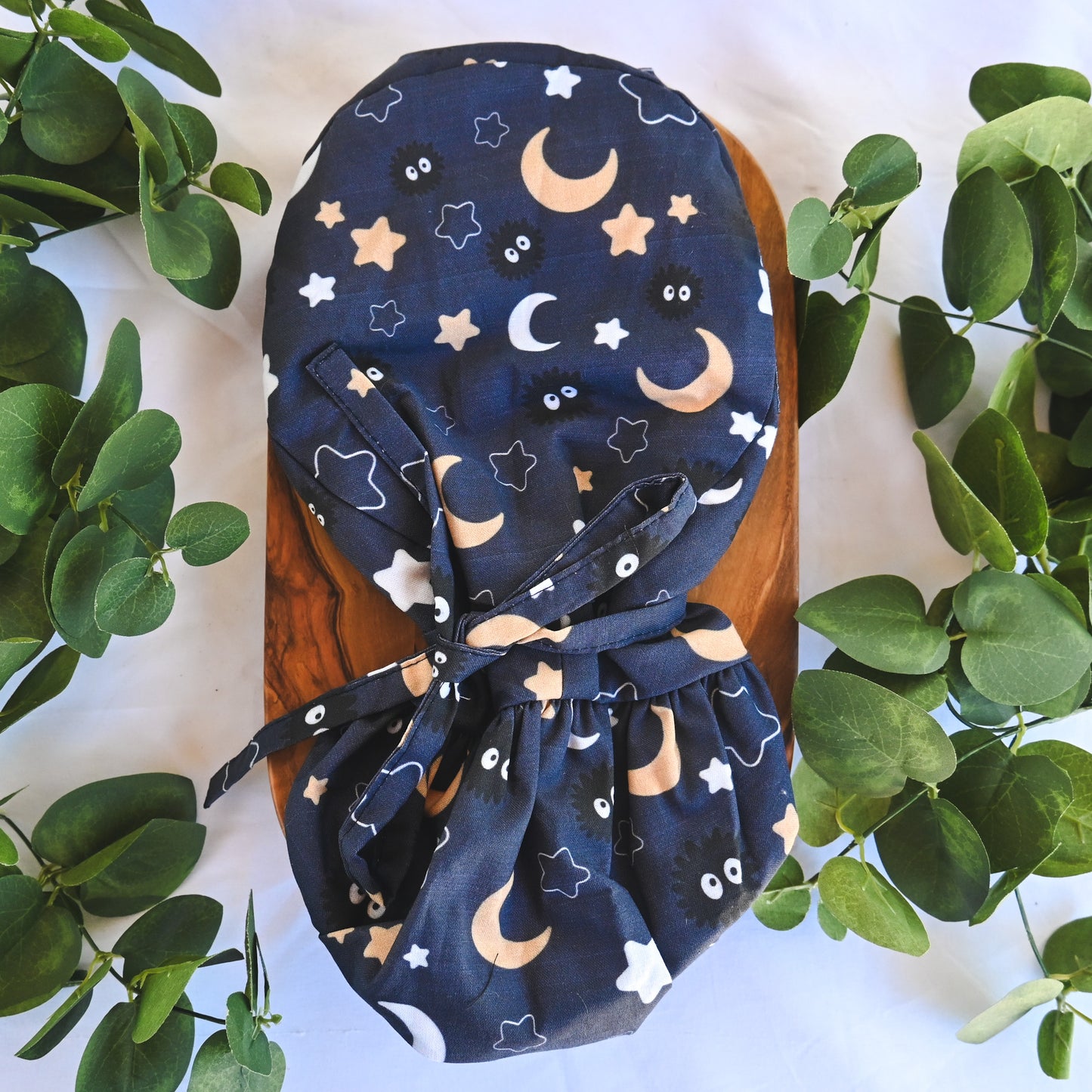 SOOT SPRITES DARK BLUE MOON AND STARS SATIN LINED PONYTAIL SCRUB CAP