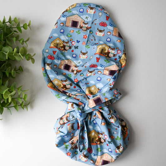 ANIMAL CROSSING - BLATHERS WITH CREATURES SATIN LINED PONYTAIL SCRUB CAP