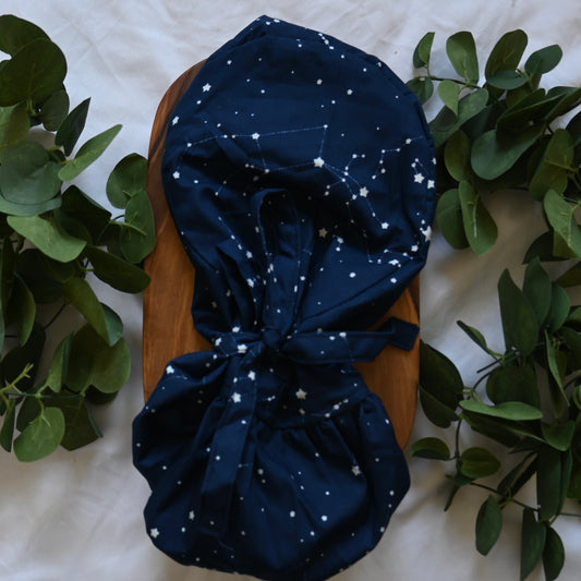 BLUE CONSTELLATIONS SATIN LINED PONYTAIL SCRUB CAP