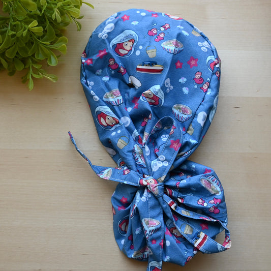 PONYO - DARK BLUE PONYO WITH SEA CREATURES SATIN LINED PONYTAIL SCRUB CAP