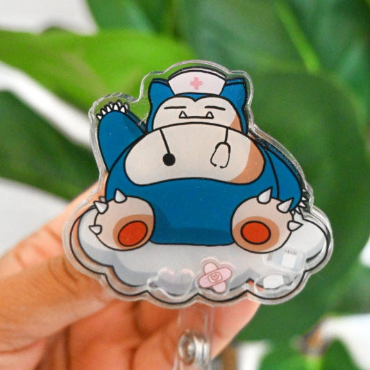 POKEMON - MEDICAL SNORLAX THEMED ACRYLIC SHAKER BADGE REEL