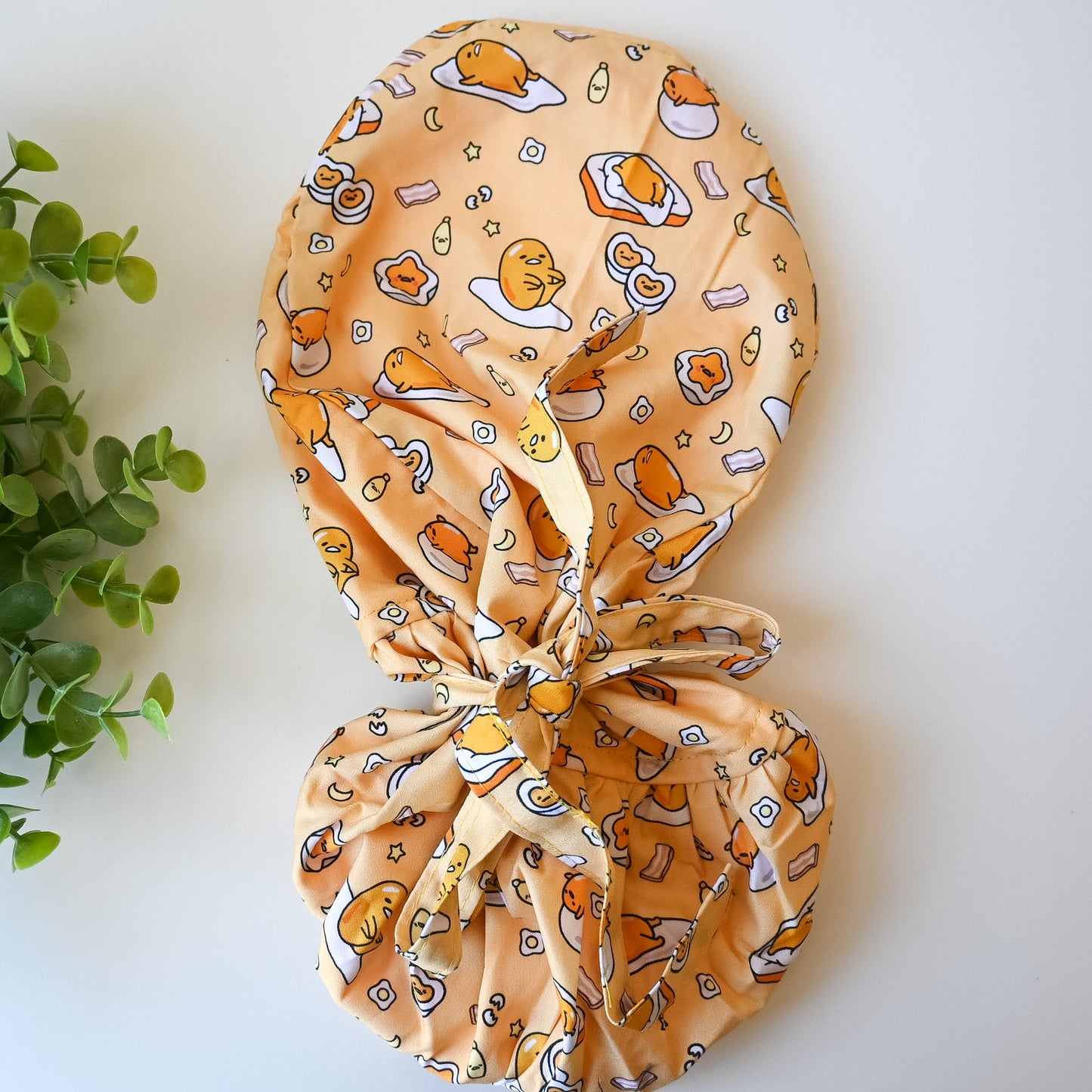 GUDETAMA THEMED SATIN LINED PONYTAIL SCRUB CAP