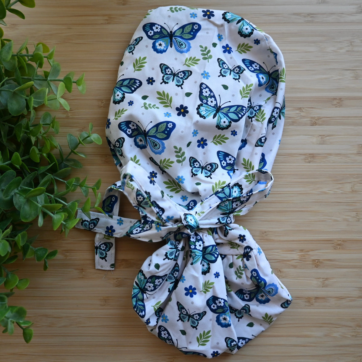 BUTTERFLY WITH PLANTS NEUTRAL THEMED SATIN LINED PONYTAIL SCRUB CAP