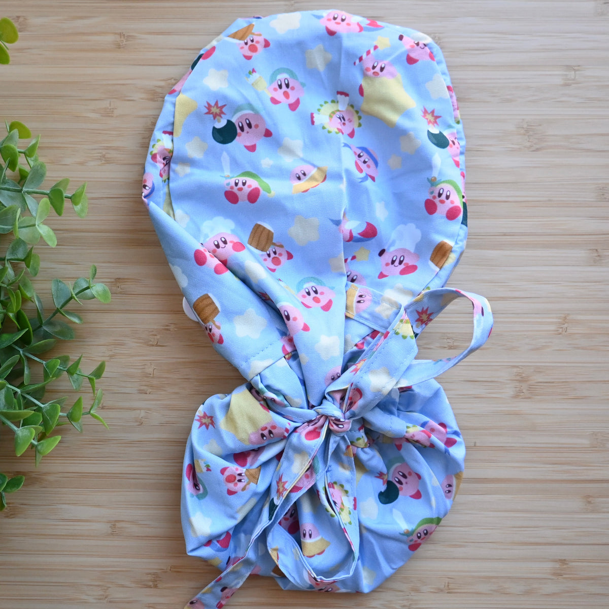 KIRBY - LIGHT BLUE DIFFERENT FORMS SATIN LINED PONYTAIL SCRUB CAP