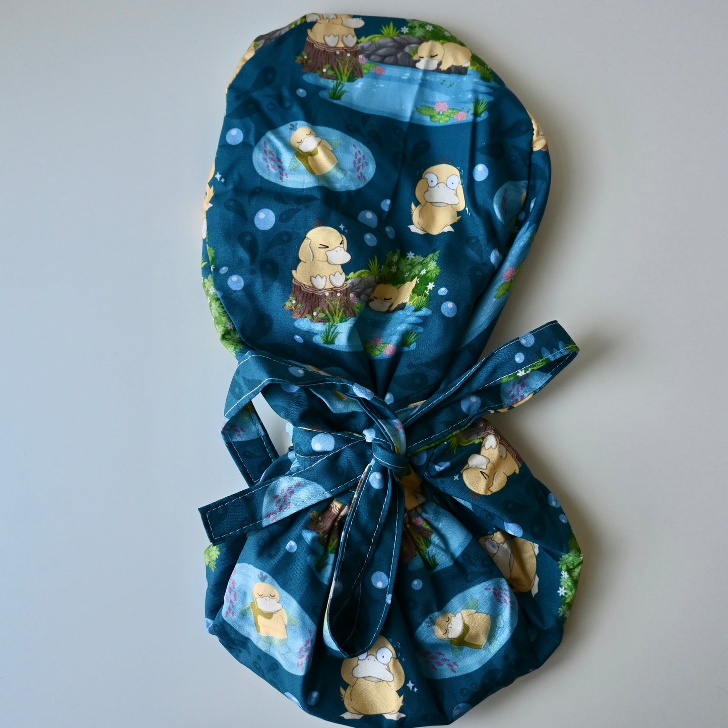 POKEMON - PYSDUCK THEMED SATIN LINED PONYTAIL SCRUB CAP