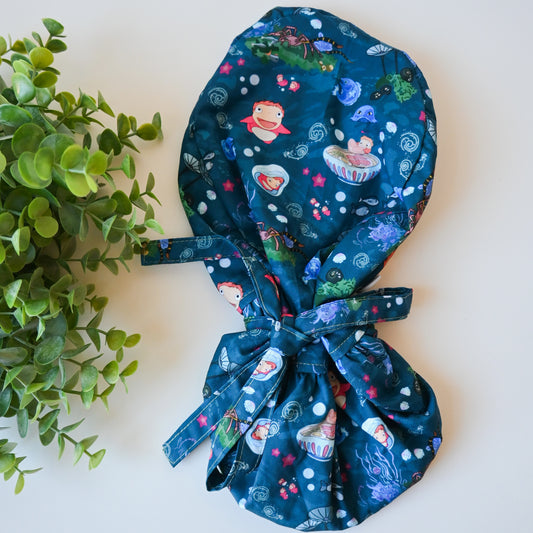 PONYO - DARK BLUE PONYO WITH SEA CREATURES SATIN LINED PONYTAIL SCRUB CAP