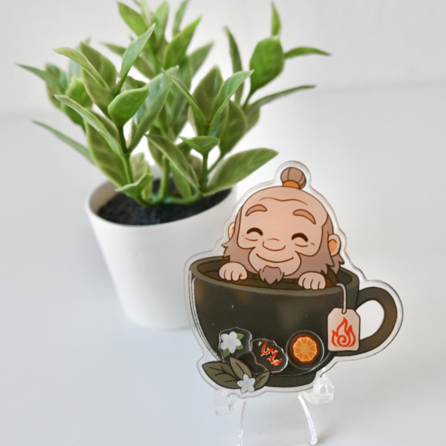 ATLA - UNCLE IROH THEMED ACRYLIC SHAKER BADGE REEL