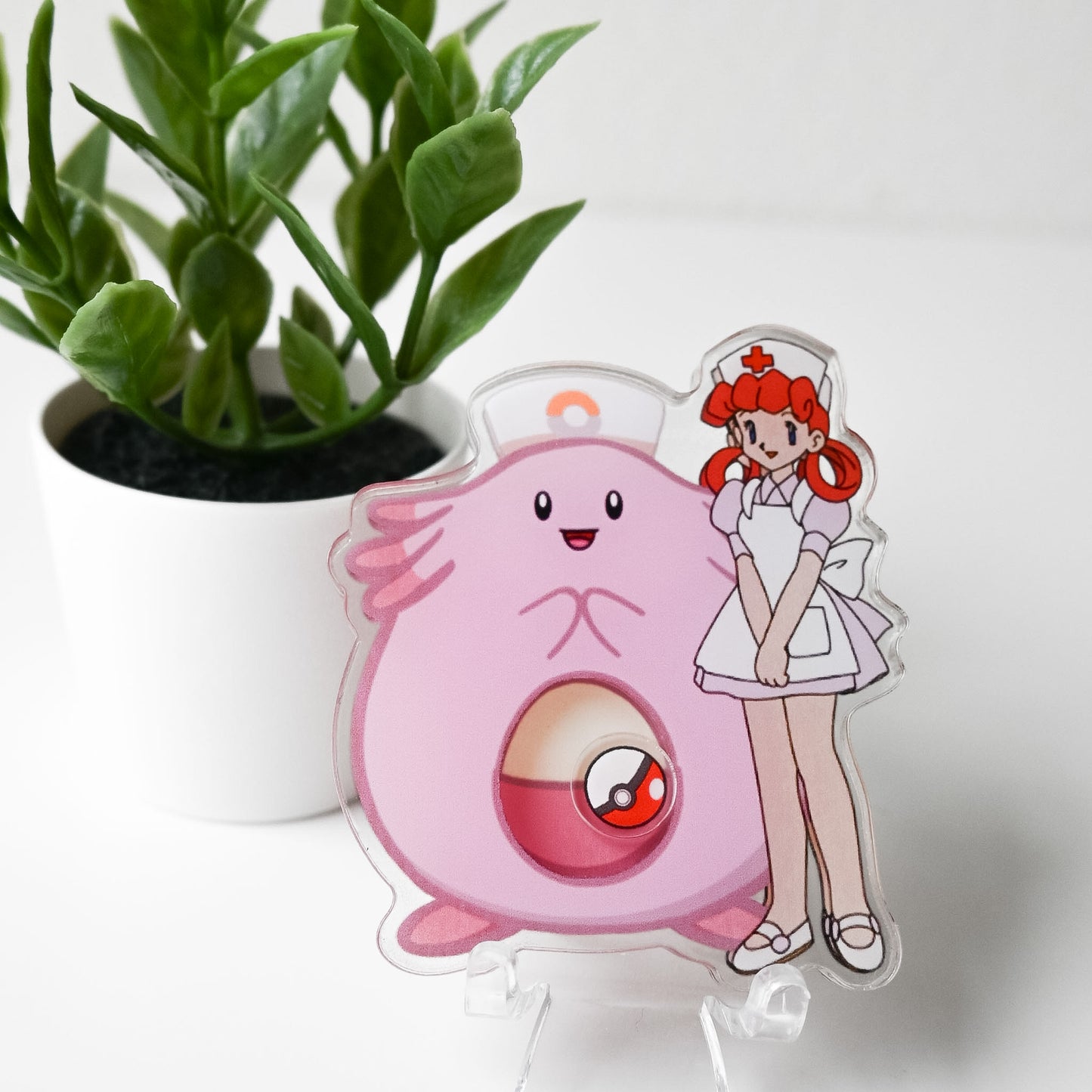 POKEMON - CHANSEY AND NURSE JOY THEMED ACRYLIC SHAKER BADGE REEL