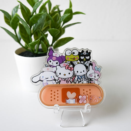 SANRIO MEDICAL THEMED ACRYLIC SHAKER BADGE REEL