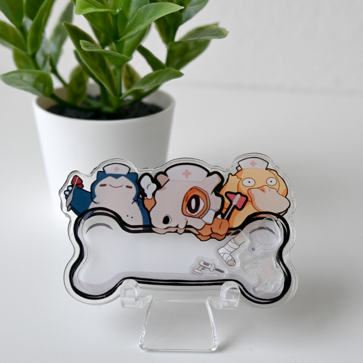 ORTHOPEDICS POKEMON THEMED ACRYLIC SHAKER BADGE REEL