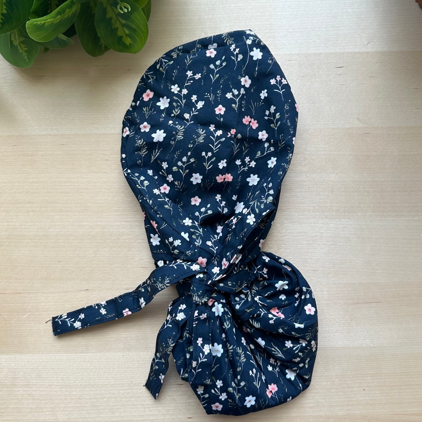 BLACK FLORAL THEMED SATIN LINED PONYTAIL SCRUB CAP