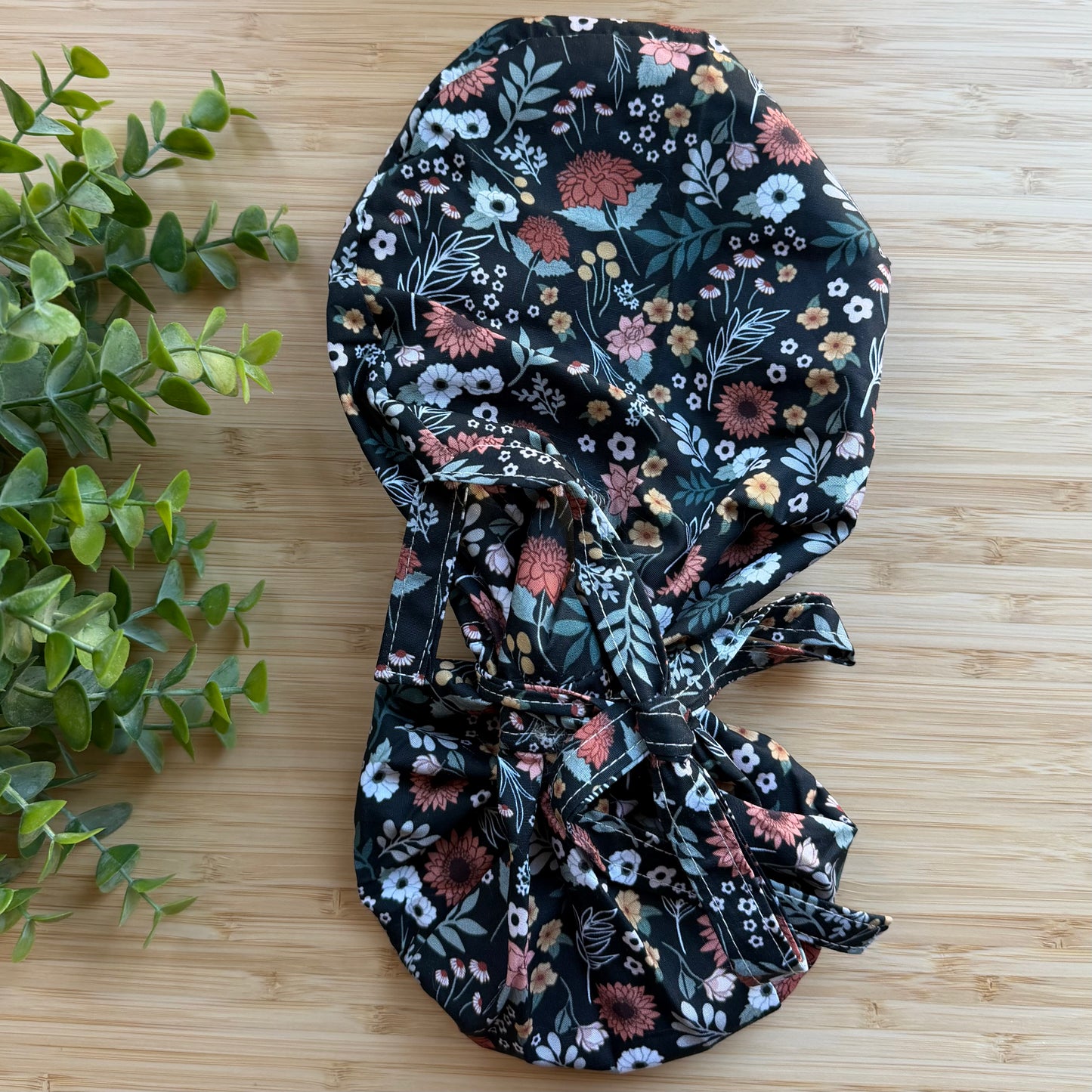 BLACK FLORAL SATIN LINED PONYTAIL SCRUB CAP