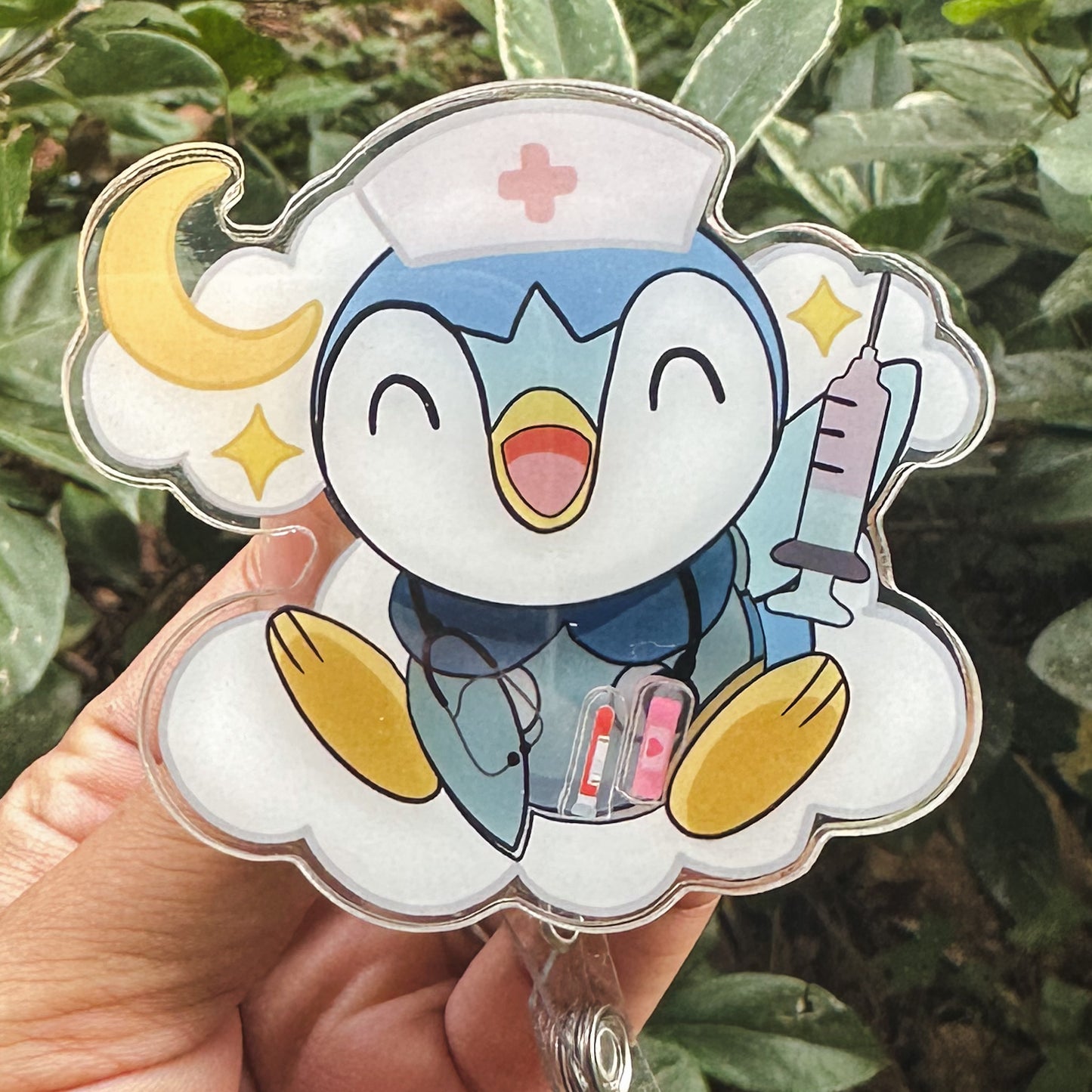 POKEMON - PIPLUP MEDICAL THEMED ACRYLIC SHAKER BADGE REEL